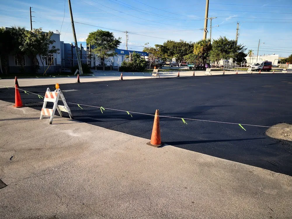 Parking lot at FLL airport sealcoated and waiting to dry before painting lines