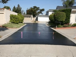 Picture of a sealcoated driveway drying